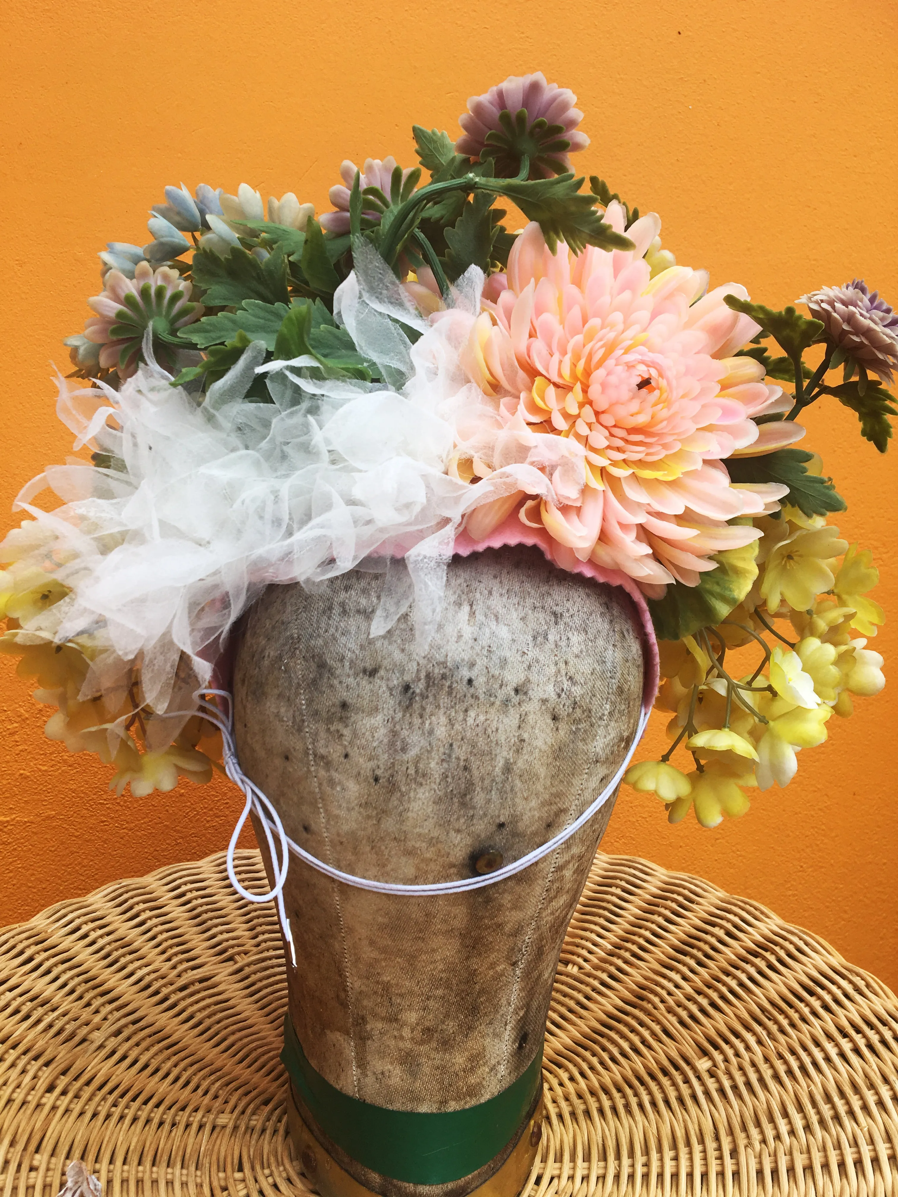 Vintage flowers in a floral Headdress in pastel shades